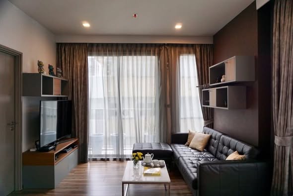 living room and bedroom of CEIL By Sansiri