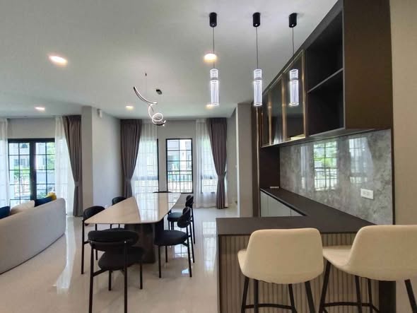 living room and kitchen of Centro Bangna