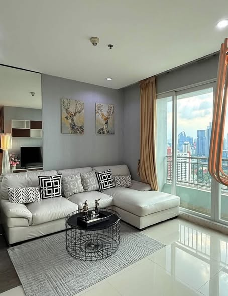 bedroom and living room of Circle Condominium