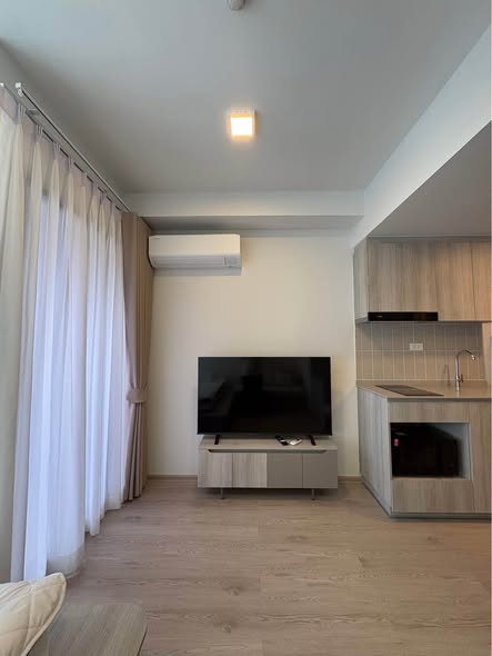 living room and bedroom of COBE Kaset-Sripatum (โค้บบ์ เกษตร-ศรีปทุม)
