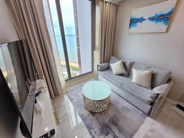 living room and bedroom of Copacabana Beach Jomtien