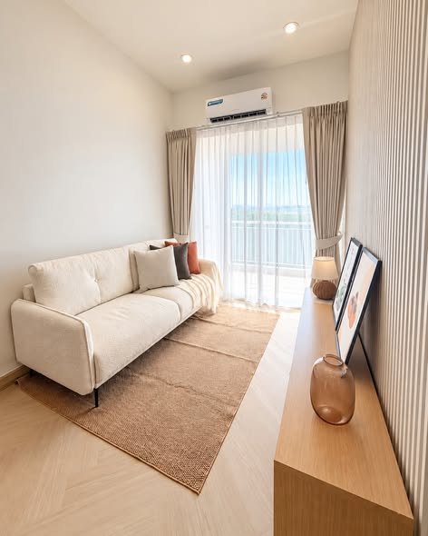 bedroom and living room of Corn Condominium