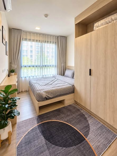 bedroom of dcondo Reef Phuket