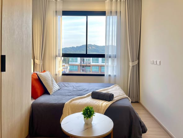 bedroom of dcondo Reef Phuket
