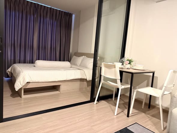 bedroom of dcondo Reef Phuket