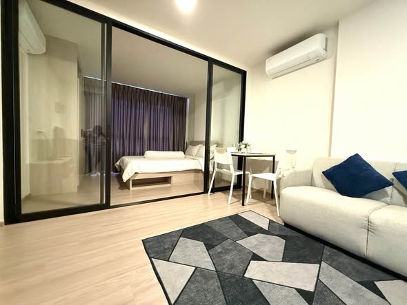bedroom and room interior of dcondo Reef Phuket