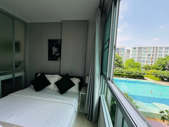 pool and bedroom of dcondo Sign Chiangmai