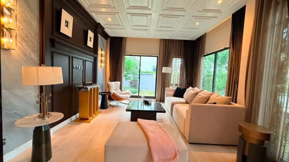 bedroom and living room of Grand Bangkok Boulevard Sukhumvit – Srinakarin