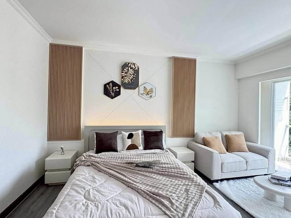 living room and bedroom of Green place condo