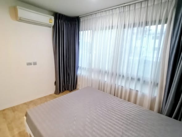 bedroom of H2 GLO Condo