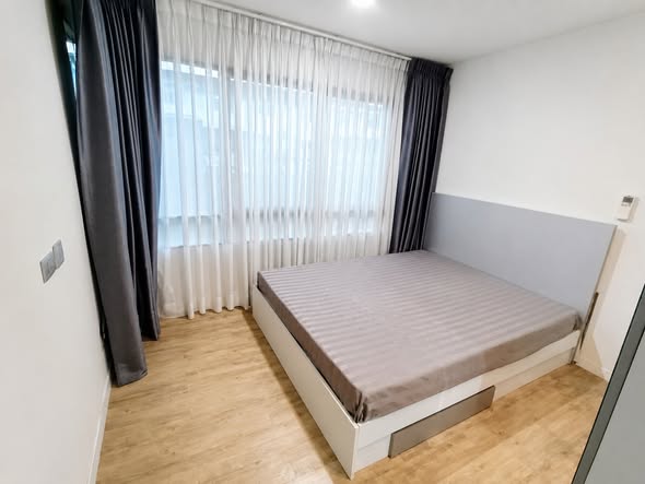 bedroom of H2 GLO Condo
