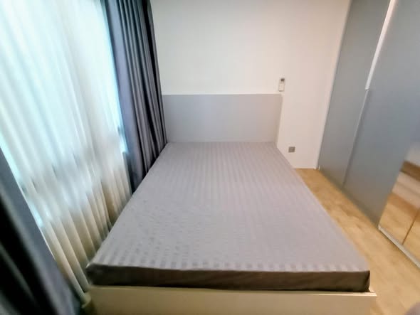 bedroom of H2 GLO Condo
