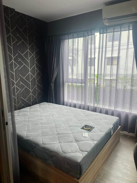 bedroom of Happy Condo Don Mueang The Terminal
