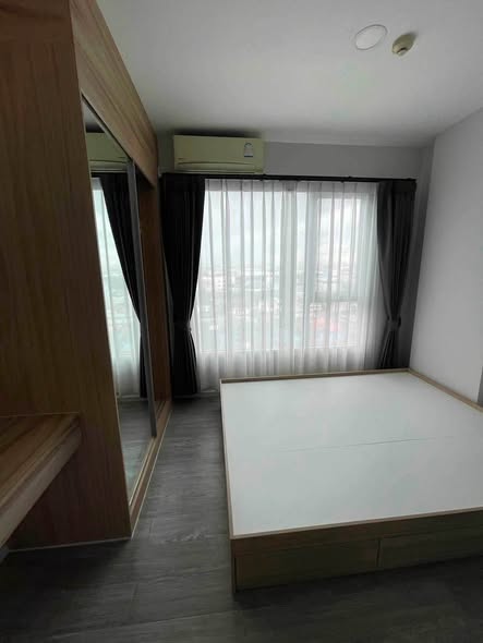 bedroom of Happy Condo Don Mueang The Terminal