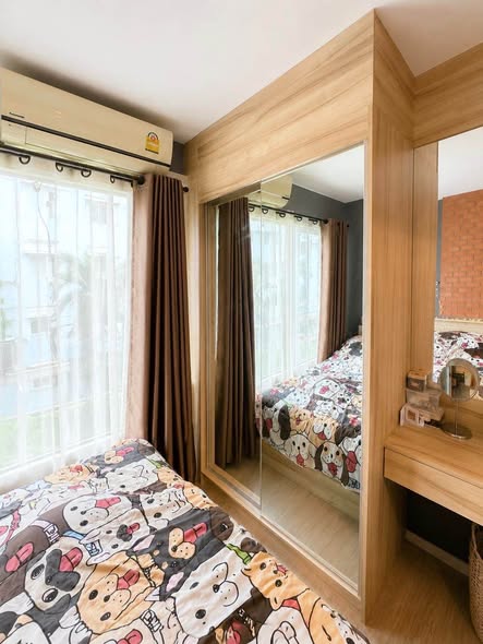 bedroom of Happy Condo Don Mueang The Terminal