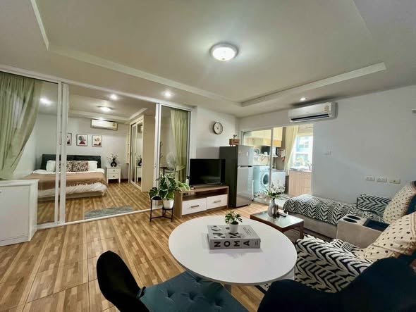 bedroom and living room of Happy Condo Rachada 18