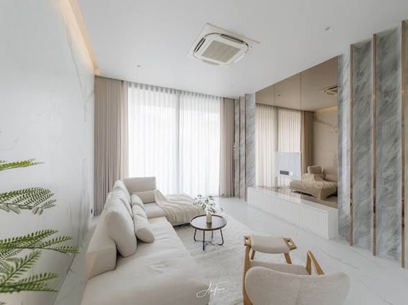 bedroom and living room of HAUS 924 – Design Holiday Home in Ekkamai, Bangkok