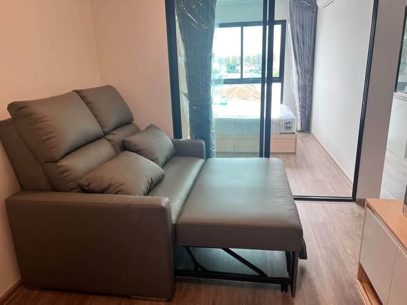 bedroom and living room of HI Kaset-Sena Nikhom Station by AOS