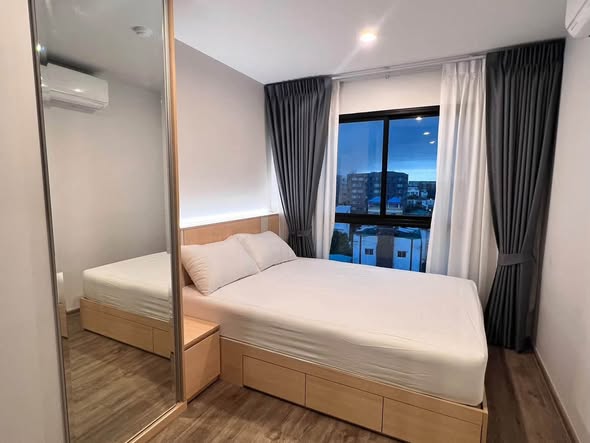 bedroom and room interior of HI Kaset-Sena Nikhom Station by AOS