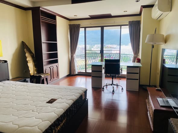 bedroom of Hillside Plaza & Condotel 4