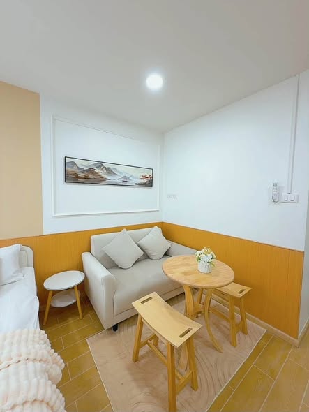 bedroom and living room of i-House Laguna Garden RCA – Building A (Blue)