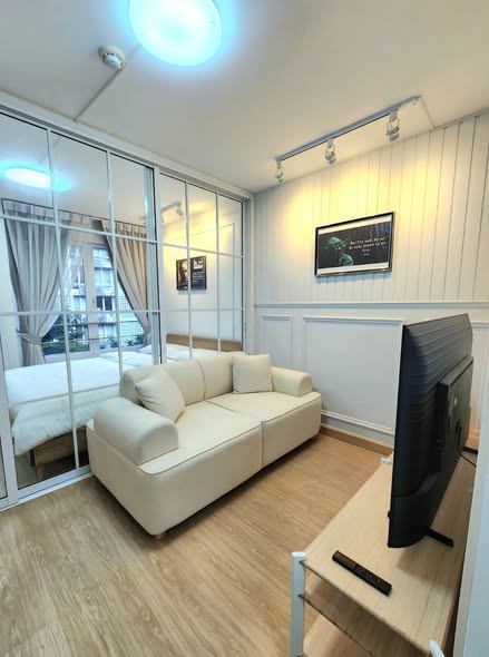 bedroom and living room of i-House Laguna Garden RCA – Building A (Blue)