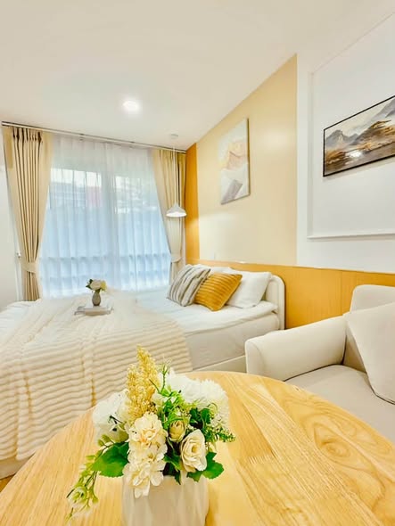 bedroom and living room of i-House Laguna Garden RCA – Building A (Blue)