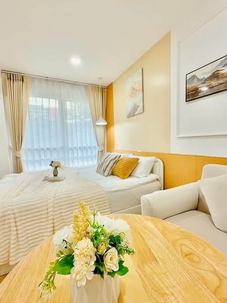 bedroom and living room of i-House Laguna Garden RCA – Building A (Blue)