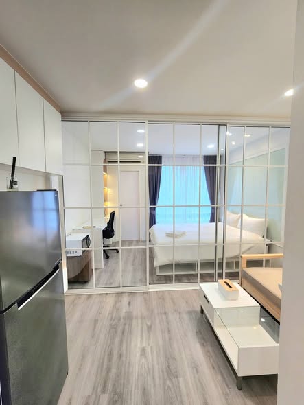 bedroom and room interior of i-House Laguna Garden RCA – Building A (Blue)