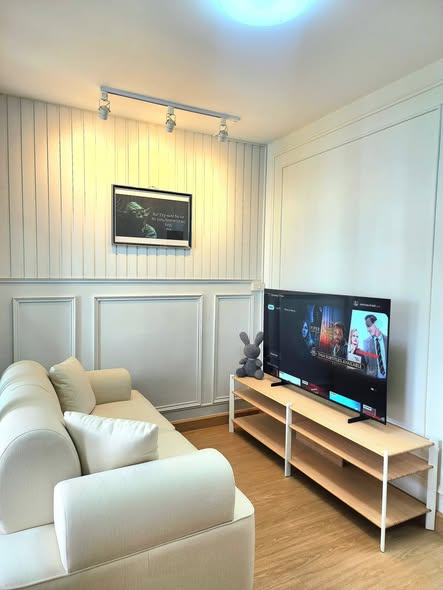 living room and room interior of i-House Laguna Garden RCA – Building A (Blue)
