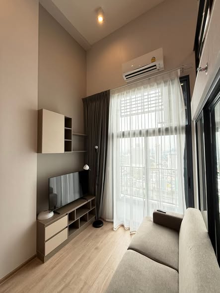 living room and bedroom of IDEO Rama9 – Asoke