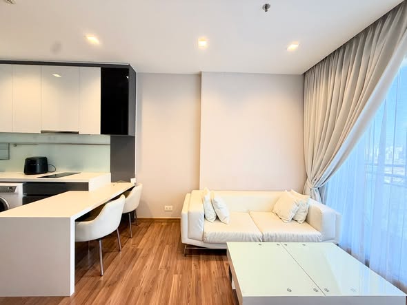 living room and room interior and kitchen of Ivy Ampio