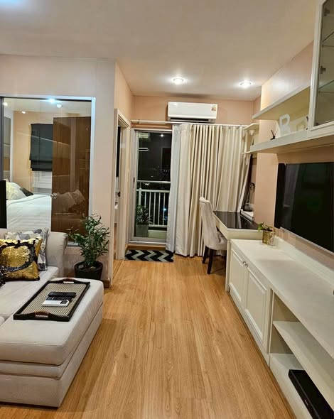 bedroom and living room of IVY River Condo