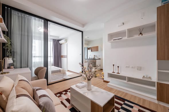 living room and bedroom of J Condo Satorn-Kallaprapruk