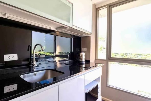 room interior and kitchen of Klass Silom Condo