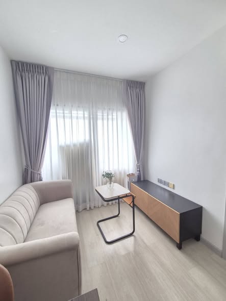 living room and bedroom of KnightsBridge Prime Sathon