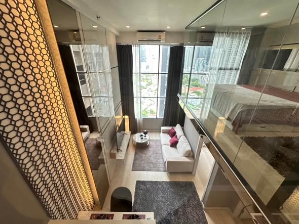 living room and room interior and bathroom of KnightsBridge Prime Sathon