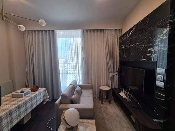 living room and bedroom of LAVIQ Sukhumvit 57