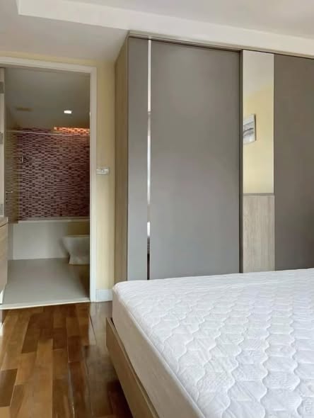 bedroom and room interior of LE NICE CONDO