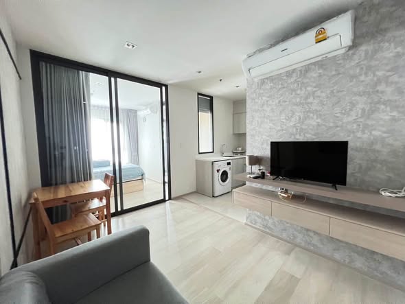 bedroom and living room of Life One Wireless