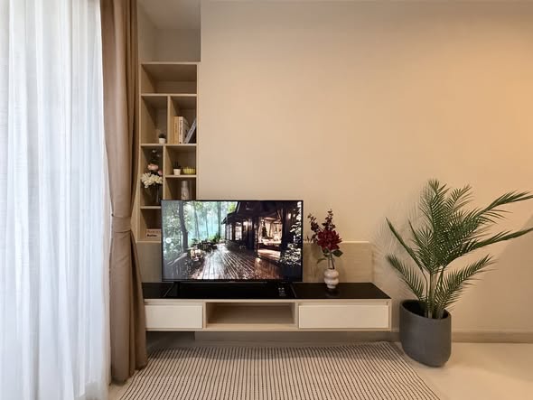 living room and bathroom of อัพเอกมัยคอนโดมิเนียม