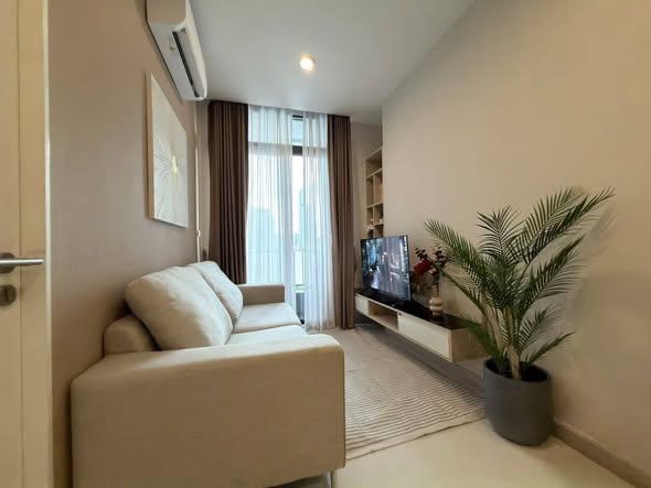 living room and bedroom of อัพเอกมัยคอนโดมิเนียม