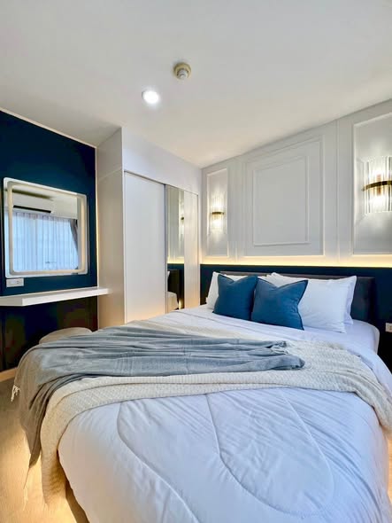 bedroom of Lumpini Condo Town Bodindecha-Ramkhamhaeng
