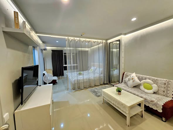 bedroom and living room of Lumpini Ville Ramkhamhaeng 44