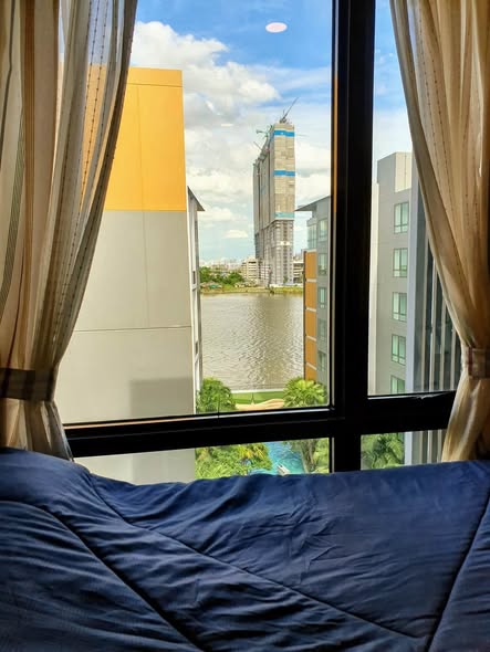 bedroom of Metro Luxe Riverfront Rattanathibet