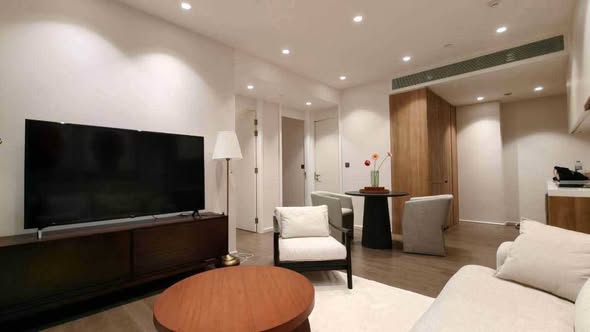bedroom and living room of MUNIQ Sukhumvit 23