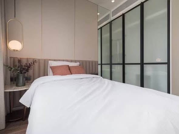 bedroom and room interior of MUNIQ Sukhumvit 23