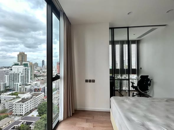 bedroom and room interior of MUNIQ Sukhumvit 23