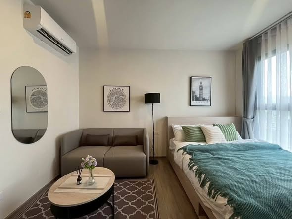 bedroom and living room of NIA by Sansiri