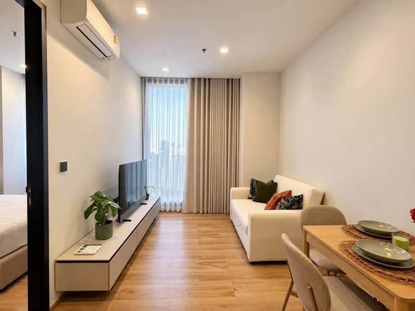 living room and bedroom of Noble Around Ari